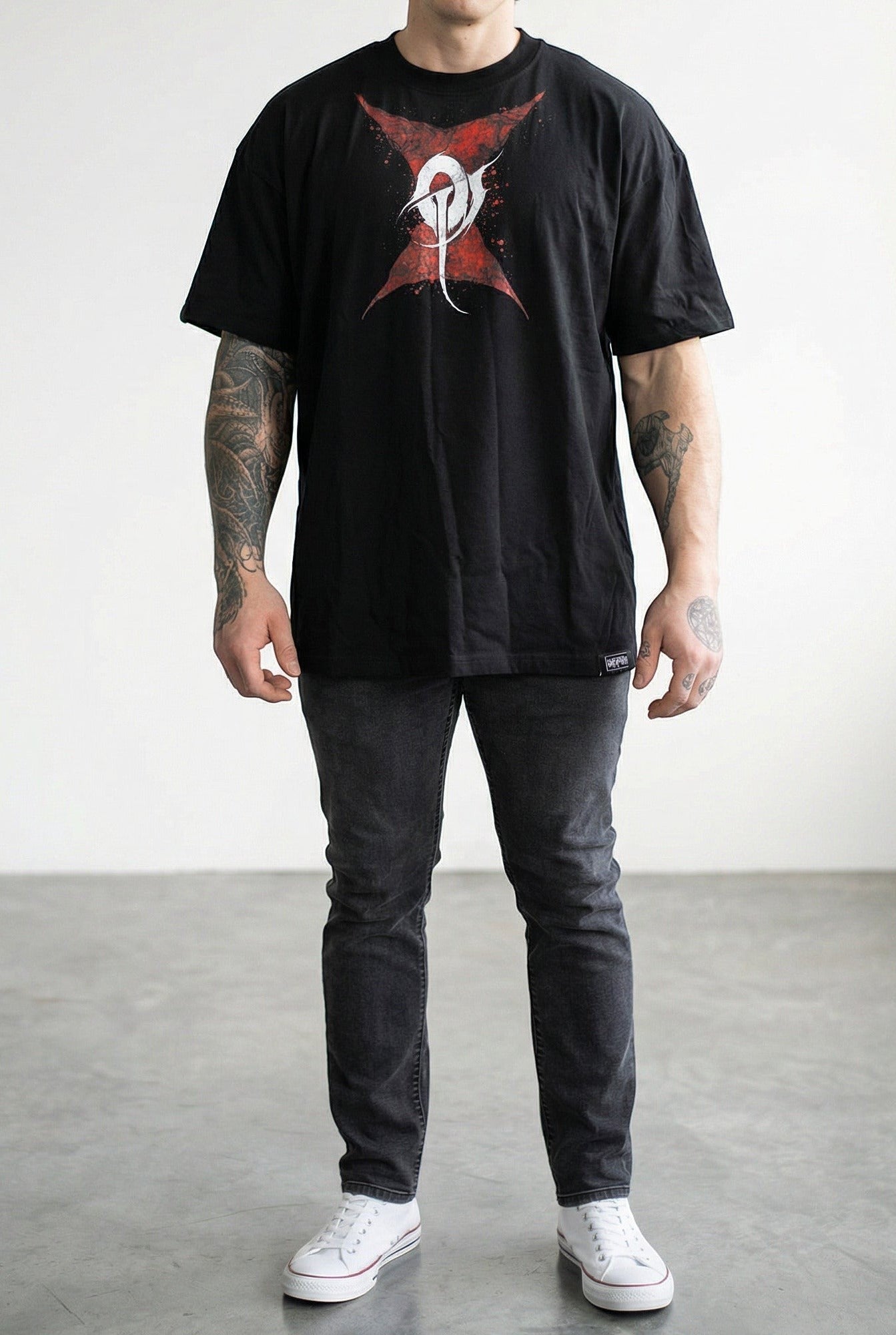 OverPower Strength Wear black oversized heavyweight cotton tee with red and white spider graphic. Unisex fit.